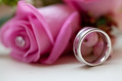 Wedding rings and buttonhole flowers