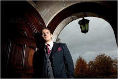 Groom in the door way at Stonehouse Court