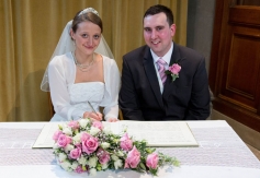 Signing the register of marriages at St.Johns Church at Palmers Green