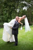 Bride getting a real firemans lift at Mulberry House