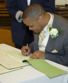 Groom signing of the register