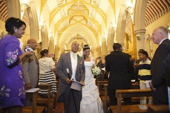 Bride and Groom walking down the aisle